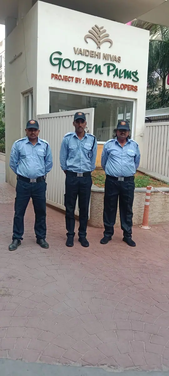 Security guards at the entrance of a gated residential community