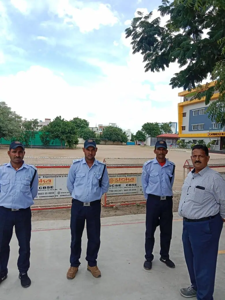 OSS security supervisor with his team of guards