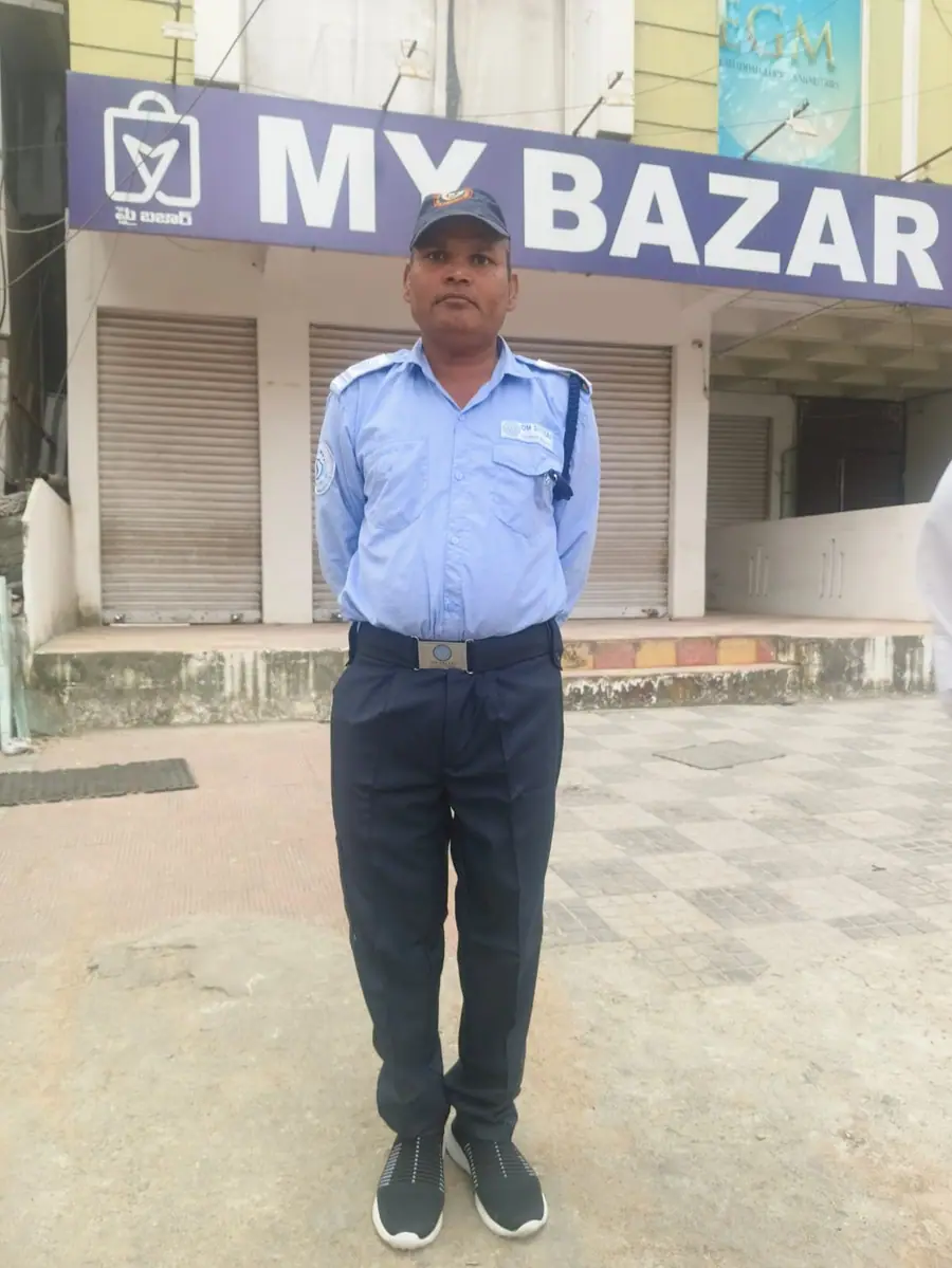 Security guard stationed outside a retail supermarket